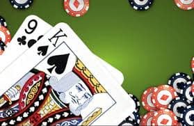 Layar permainan baccarat menunjukkan kartu Pemain dan Banker